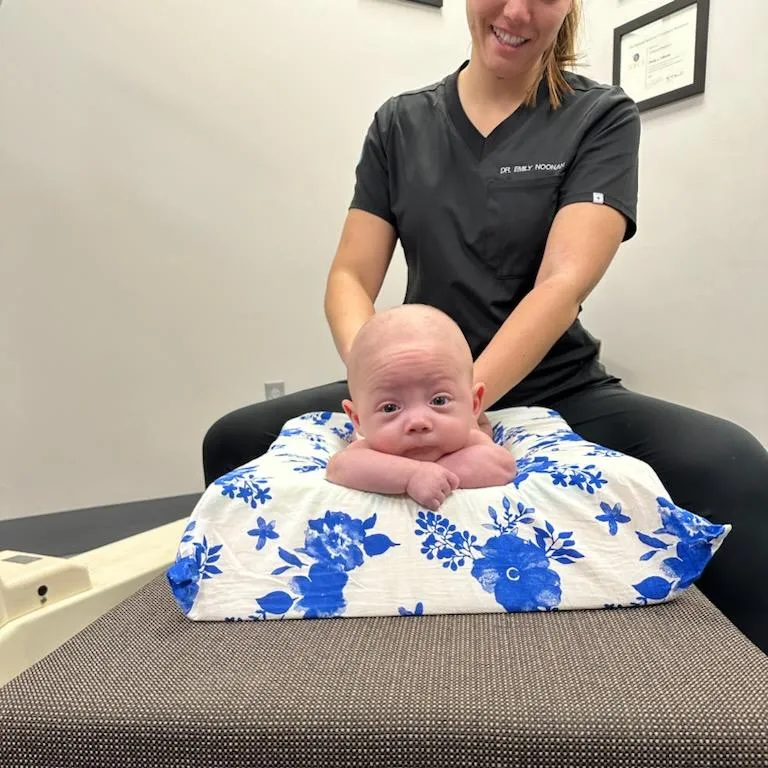Dr. Noonan giving a gentle infant adjustment