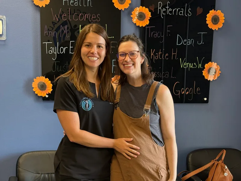 Dr. Noonan with an expecting patient at Full Circle Health in Chesterfield